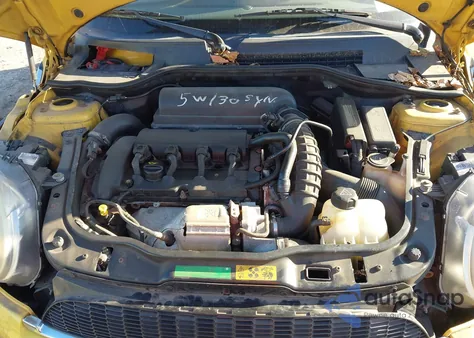 2009 Mini Cooper S z USA, uszkodzony, nr VIN WMWMF73569TX40077